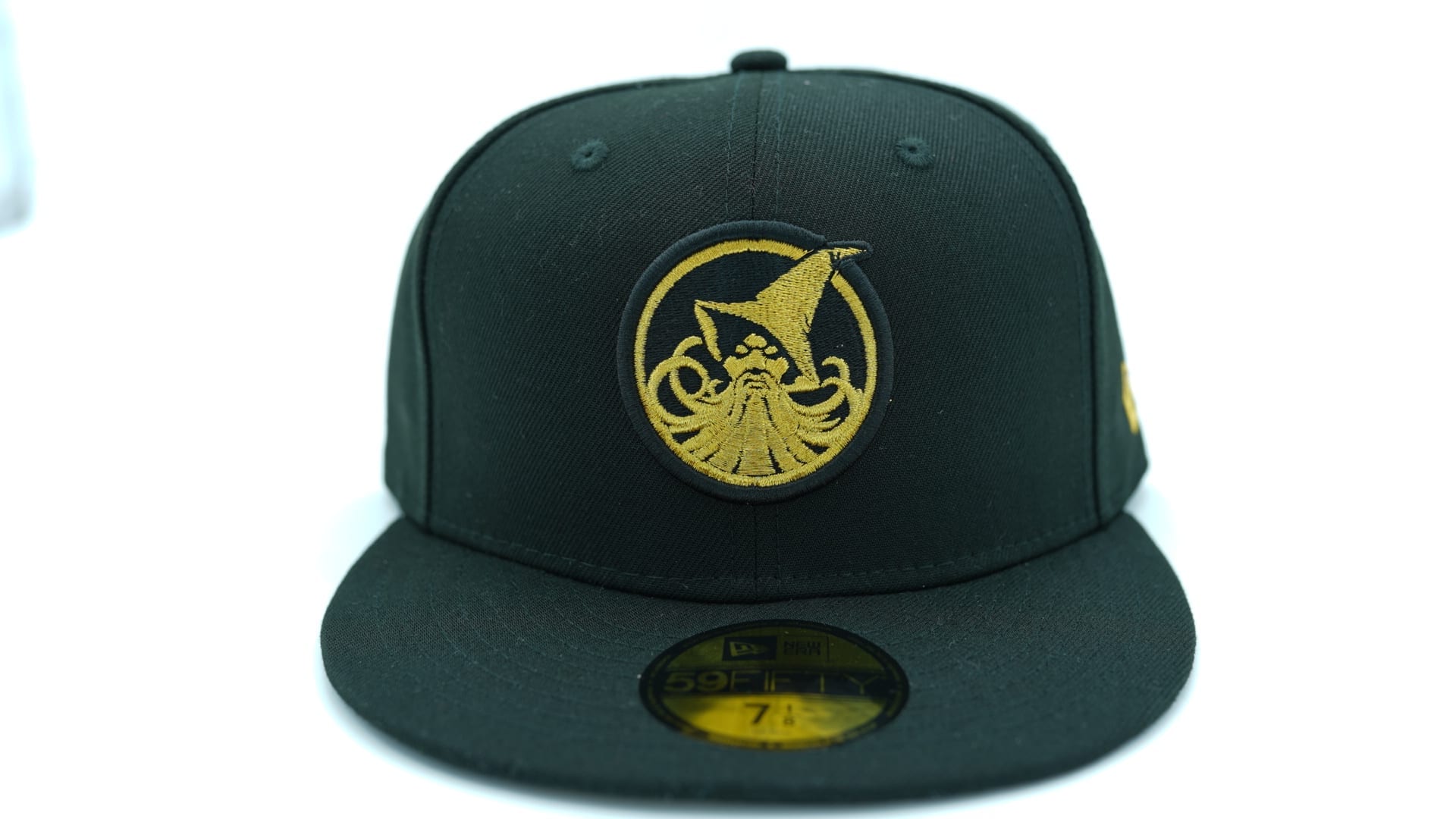 This fitted is on a Black base with a White Hello Kitty accented by her 
